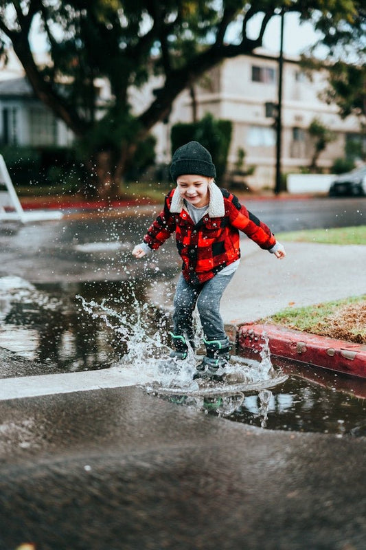 Remember being a kid, splashing in puddles without a care? Rediscover that wild spirit! - Wild Wisp Apparel